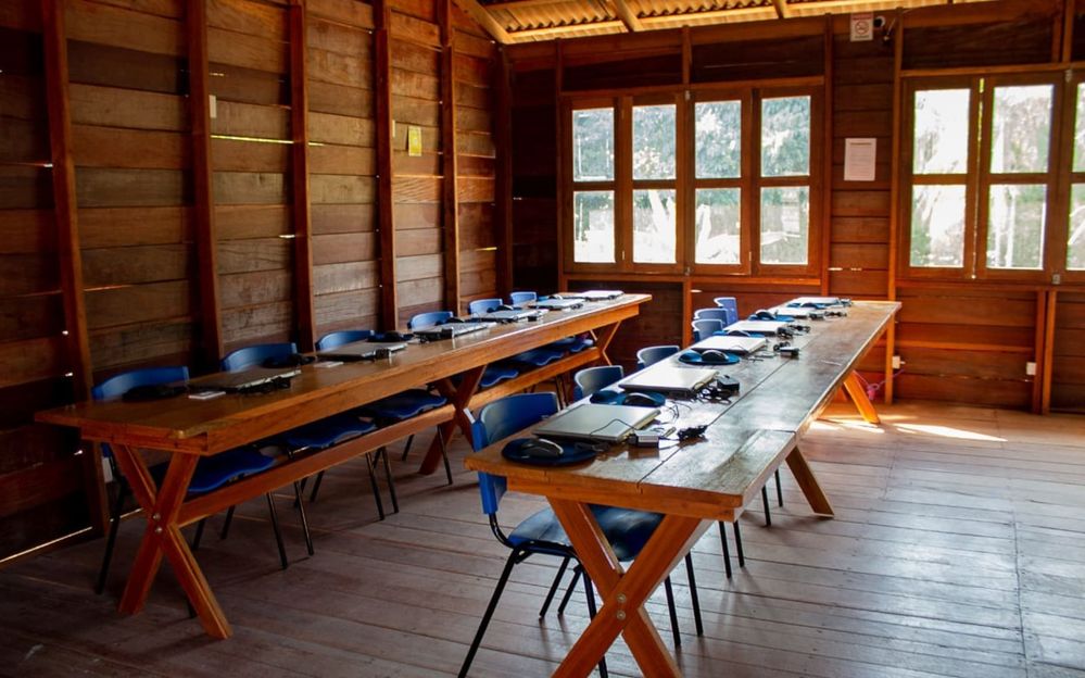 Classroom in the Amazon Rainforest village set up with laptops loaded with Windows 10 and Office 365