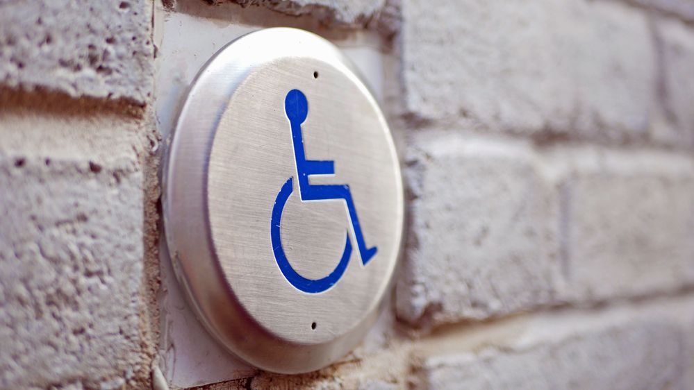 Picture of a disabled access door button