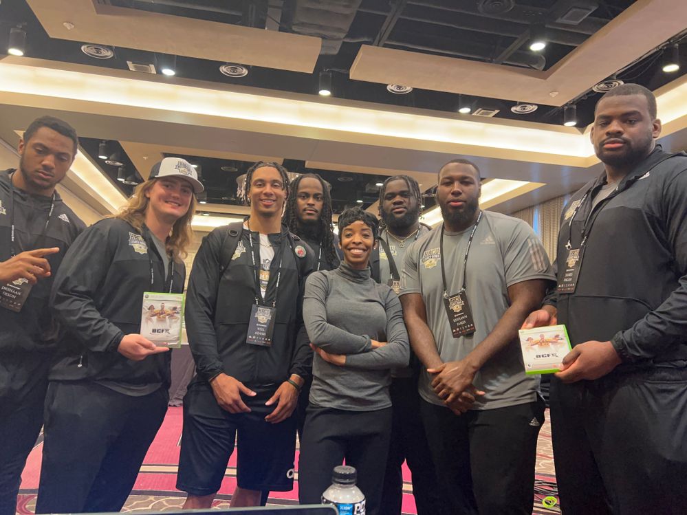 April Speight with student athletes at the HBCU Legacy Bowl.