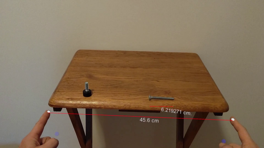 Side of table measured with 2 fingers