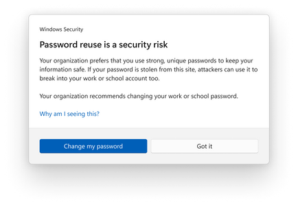 Windows Security pop-up notification informing the user that password reuse is a security risk