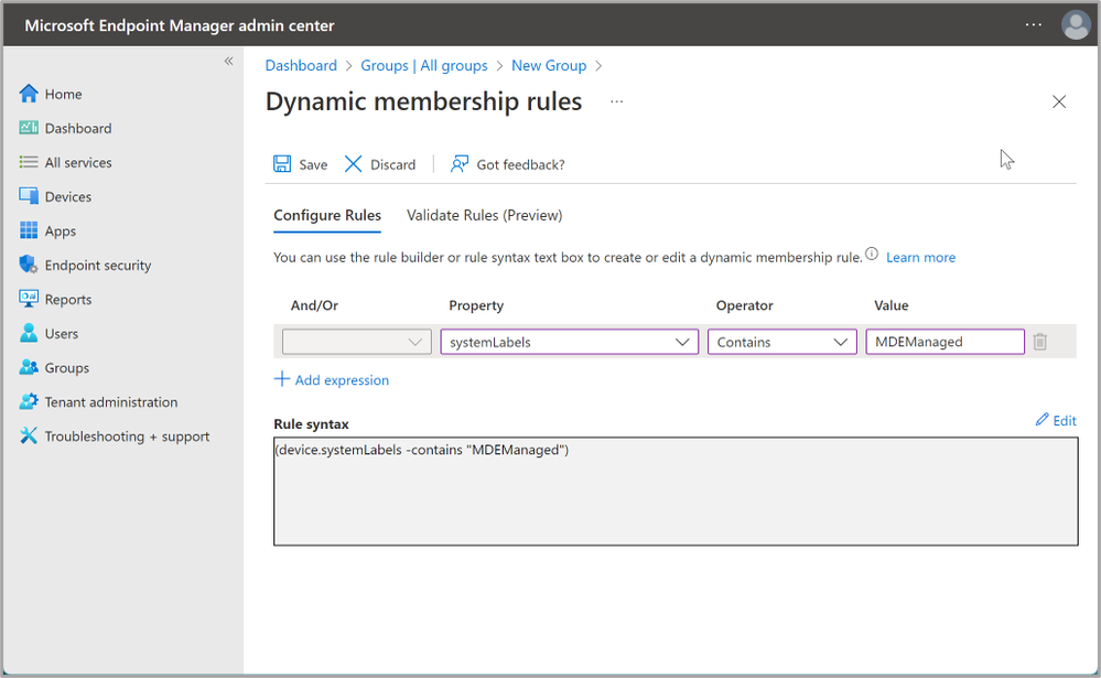 A screenshot of the Dynamic membership rules pane with the example query added to the Rule syntax in the Configuration Rules settings.