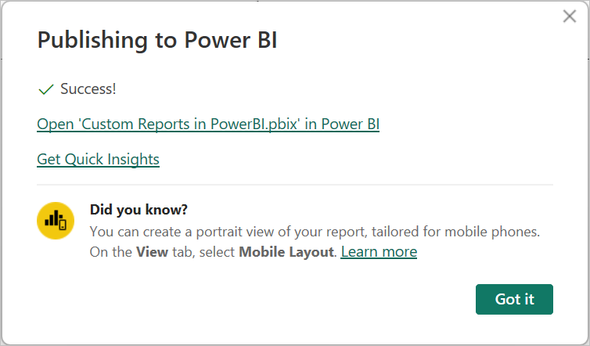 Screenshot of a dialog box confirming successful publication of the Power BI report and options to open it.
