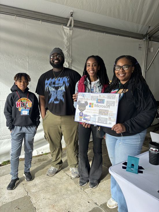 An image of a group of participants from the launch of a Microsoft MakeCode game called "But can you code?" at the Atlanta Science Festival.