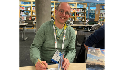Freek Berson signs his book at the Microsoft Library, Redmond.