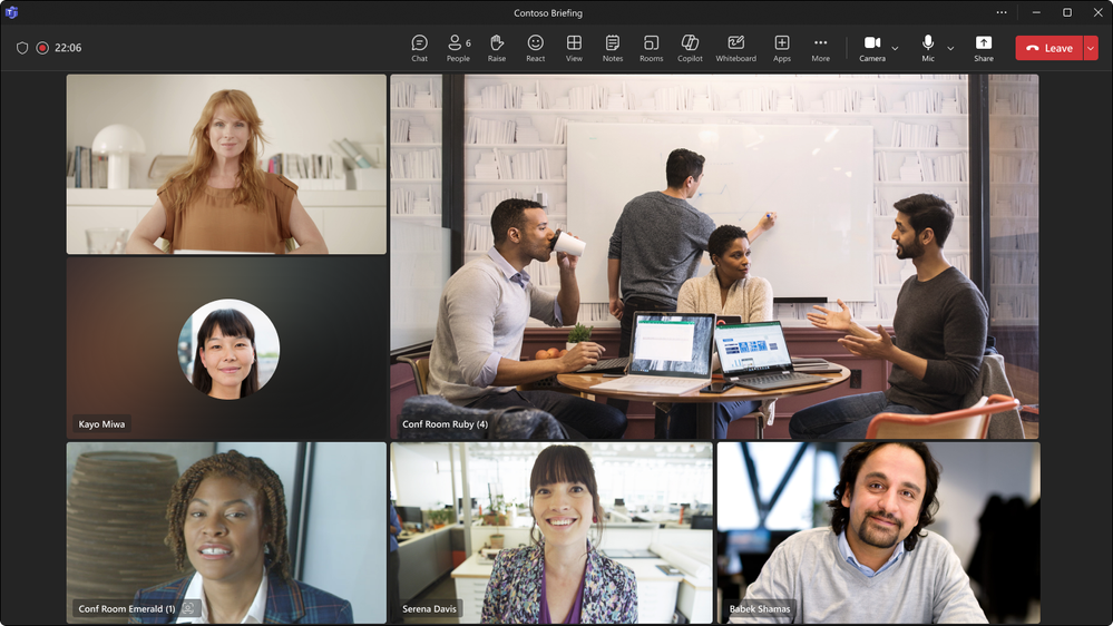 A Teams meeting showing how dynamic video tile resizing makes the video tile of people together in a meeting room larger than the video tiles of other attendees in different locations.