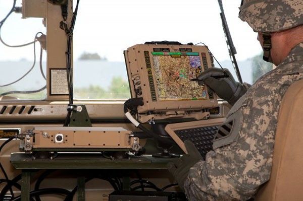 A soldier using a computer. photo credit: Army.mil
