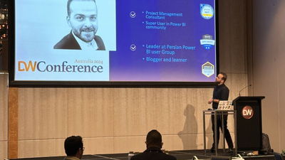 Vahid Doustimajd, Microsoft MVP for Data Platform on stage at the Digital Workplace Conference.