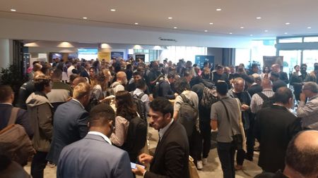 Crowd of experts discussing together