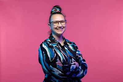 A woman smiling