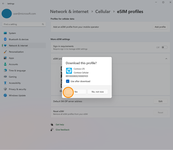 Screenshot of a dialog box asking permission to download a selected profile from eSIM profiles in Windows Settings