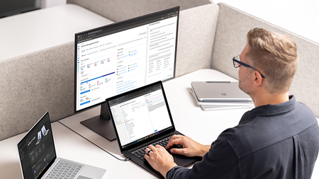 IT Pro sitting at desk working at their computer