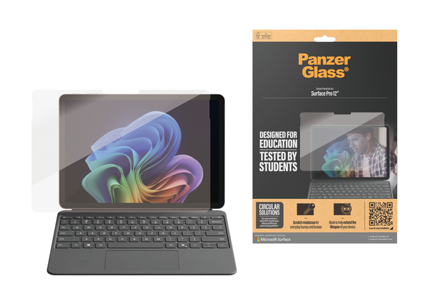Surface Pro with screen protector over the screen with packaging to the right of the device