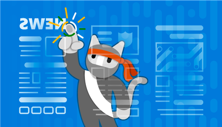 A cat is touching the word "news" on a screen