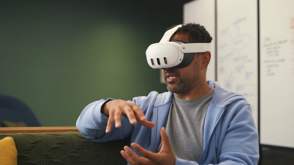 Image showing a user participating in an immersive Teams event using a Meta Quest VR headset