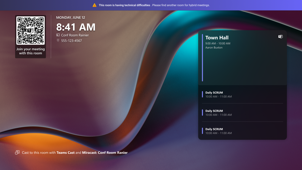 A Teams rooms panel showing an issue notification that lets attendees know that this room is not available for hybrid meetings.