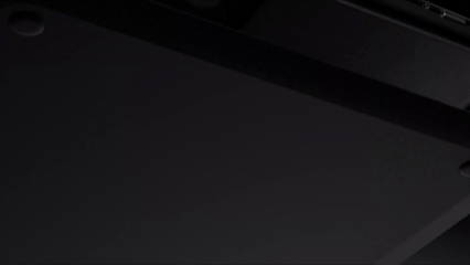 stylized and exploded laptop representation of advanced haptic capabilities on Surface showing internal computer parts and tactile feedback on trackpad