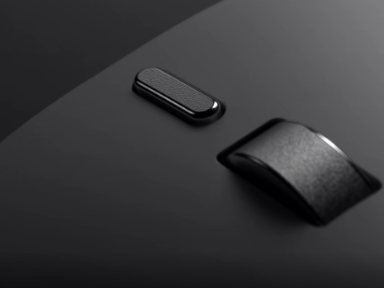 A close up image of the wheel and customizable action button on the Surface Mouse.