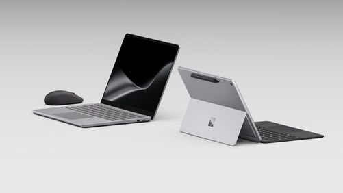 Surface Mouse, Surface Laptop, and Surface Pro featured in stylized image