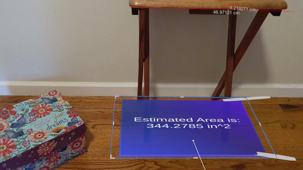 Area of floor being estimated with blue box