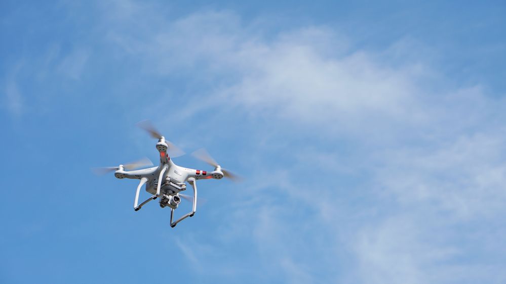 Drone flying with clear sky