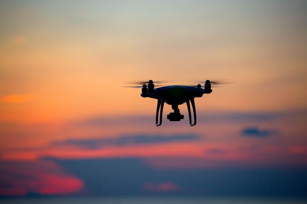 Drone flying at dusk