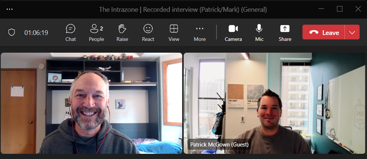 The Intrazone host and guest, left-to-right: Mark Kashman (Senior product manager – Microsoft) [Host and virtual selfie arm] with Pat McGown (CEO – Cloudwell) [guest] – during the interview hosted via Teams (note “The Dirt” and “The Cloud” posters in the background – their backstory in the episode).